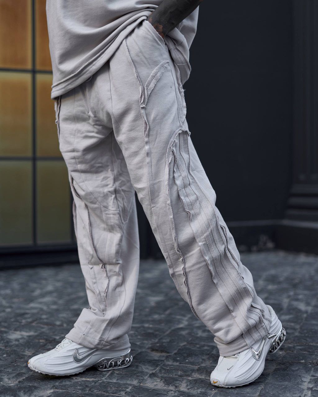 photo_2026-02-17_13-12-56 شلوار اسلش مردانه مدل Stripe Raw – طوسی روشن کد 2410 - Image 1