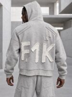 هودی اورسایز پچ‌دار F1K با دوخت فرسوده و زیپ آستین - تصویر 7