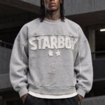 دورس اورسایز طوسی طرح STARBOY با وصله‌ی فرسوده و ستاره - نمای جلو